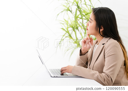 Young woman wearing a business suit Business image 120090555