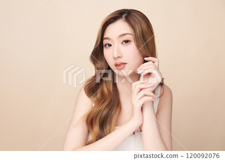 Beautiful young asian woman with clean fresh skin on beige background, Face care, Facial treatment, Cosmetology, beauty and spa, Asian women portrait. 120092076