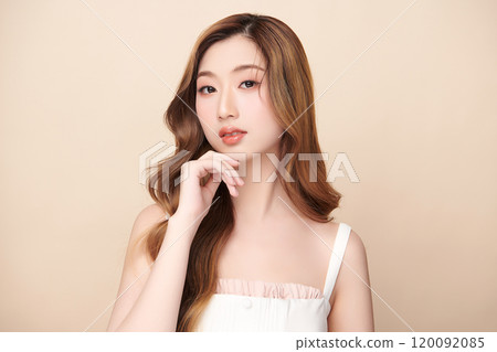 Beautiful young asian woman with clean fresh skin on beige background, Face care, Facial treatment, Cosmetology, beauty and spa, Asian women portrait. 120092085