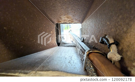 Aiming a gun through a gun slit 120092178