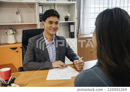 Job HR applicants having an interview with Human resource manager jobs interviewing with confident candidate at business firm office give cv resume. Job Interview with headhunter agent and applicant Job HR applicants having an interview with Human resource manager jobs interviewing with confident candidate at business firm office give cv resume. Job Interview with headhunter agent and applicant 120092269