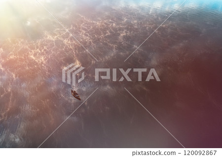 A Serene Aerial View of a Vast Ocean Under Glorious Sunlight, Capturing Natures Beauty and Peace A Serene Aerial View of a Vast Ocean Under Glorious Sunlight, Capturing Natures Beauty and Peace 120092867