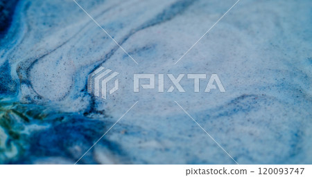 Blue acrylic. Wavy enamel. Disturbance of opaque paint. Pouring colored ink with gold glitter stone texture artistic emulsion curls. 120093747