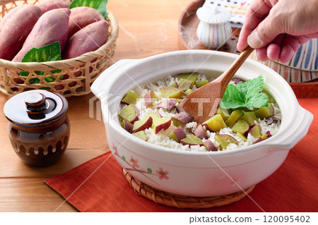 Sweet potato rice cooked in a clay pot Sweet potato rice cooked in a clay pot 120095402