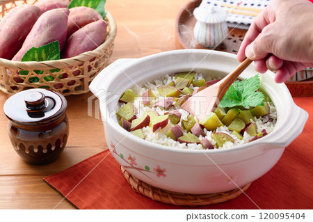 Sweet potato rice cooked in a clay pot Sweet potato rice cooked in a clay pot 120095404