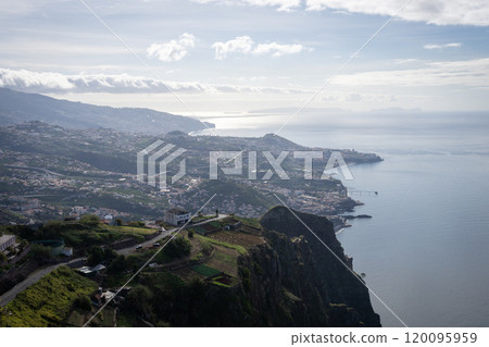Beautiful vista on coastal city from high cliff, Madeira, Portugal Beautiful vista on coastal city from high cliff, Madeira, Portugal 120095959