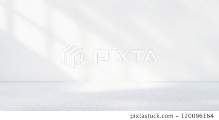 Gentle fog blankets the tranquil beach, creating a peaceful atmosphere at dawn, with soft waves lapping the shore. 120096164