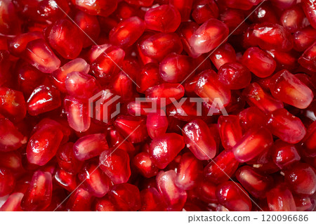 Red pomegranate top view. Pomegranate seeds Red pomegranate top view. Pomegranate seeds 120096686