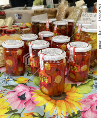 Pickled peppers in jar. Chili with tuna. Traditional organic food. Business and entrepreneurship. 120096704