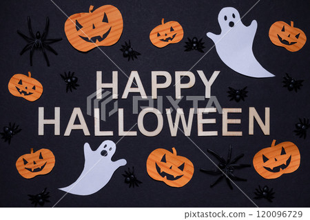 Happy Halloween inscription on black background with pumpkins, spiders and ghosts. Halloween holiday. For backgrounds and presentations Happy Halloween inscription on black background with pumpkins, spiders and ghosts. Halloween holiday. For backgrounds and presentations 120096729
