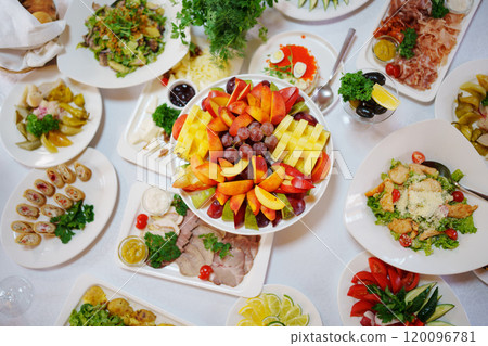 A banquet table served for a big holiday.  120096781