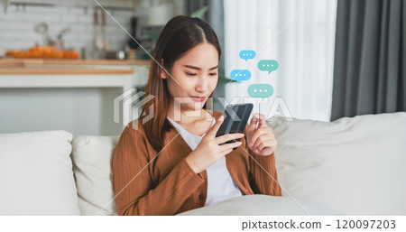 Young asian woman using mobile smartphone Young asian woman using mobile smartphone 120097203