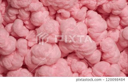 Pink packing peanuts fill a container, providing a soft and protective layer for fragile items Pink packing peanuts fill a container, providing a soft and protective layer for fragile items 120098484