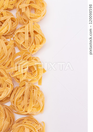 Classic Italian Raw Egg Fettuccine on White Background 120098598