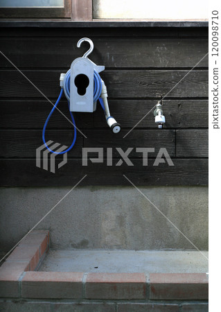 Hand washing faucet in an old house 120098710