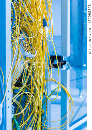 server with connected fiber optics cables 120098898