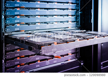 Slot for the hard drives is sticking out in the server room. Com Slot for the hard drives is sticking out in the server room. Com 120098980