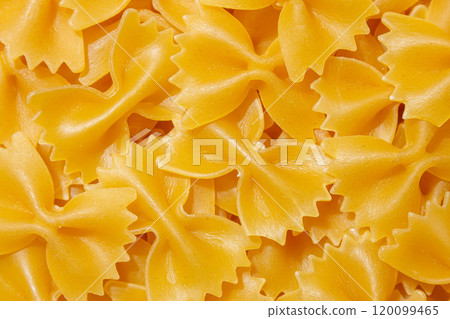 Uncooked Farfalle Pasta Background 120099465