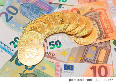 A Heap of Bitcoin Coins on the Euro Banknotes 120099466