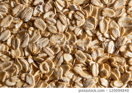 Dry Uncooked Oat Flakes background Dry Uncooked Oat Flakes background 120099848