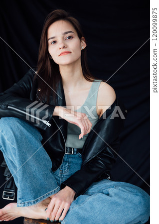 Portrait of Beautiful Fashionable Slender Woman in Jeans on Black Background Portrait of Beautiful Fashionable Slender Woman in Jeans on Black Background 120099875