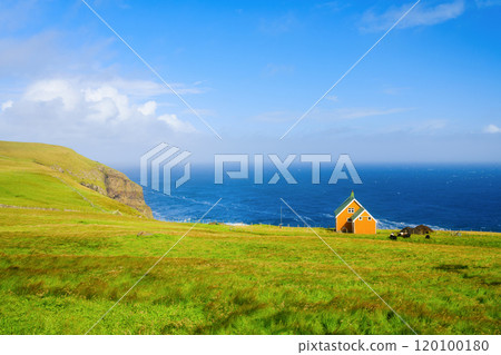Suduroy Island, Faroe Islands, Denmark. Panoramic view of the rocks, field and the ocean. Suduroy Island, Faroe Islands, Denmark. Panoramic view of the rocks, field and the ocean. 120100180