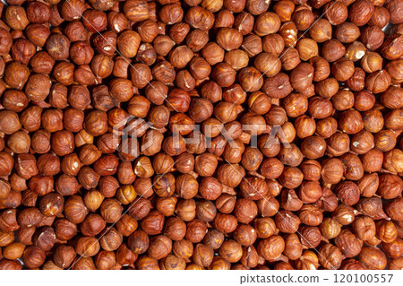 Scattered Peeled Hazelnut. Background from Hazelnuts Scattered Peeled Hazelnut. Background from Hazelnuts 120100557