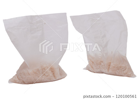 A Plastic Bags of White Long Grain Rice - Isolated on White A Plastic Bags of White Long Grain Rice - Isolated on White 120100561