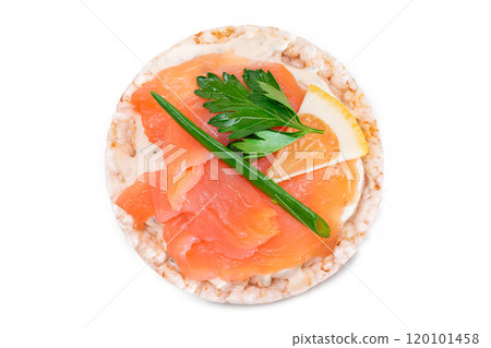 Rice Cake Sandwich with Fresh Salmon, Lemon and Greens - Isolated 120101458
