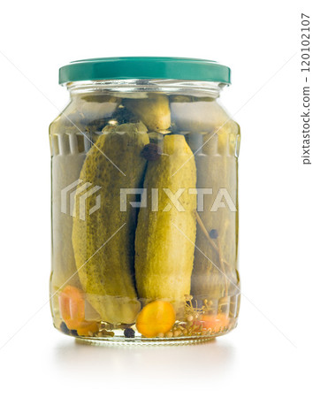 Pickles. Marinated cucumbers in jar isolated on white background. 120102107