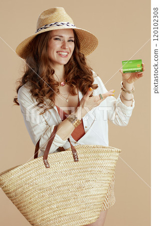 smiling stylish woman in blouse and shorts 120102308
