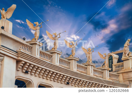 Beautiful statues and sculptures adorn walls of a medieval castle in Ba Na Hills Park in Da Nang in Vietnam Beautiful statues and sculptures adorn walls of a medieval castle in Ba Na Hills Park in Da Nang in Vietnam 120102666
