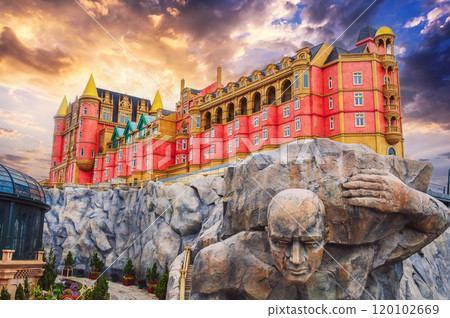 Fantastic fabulous stone castle on mountain at sunset in Ba Na Hills Park in Da Nang in Vietnam in Asia 120102669