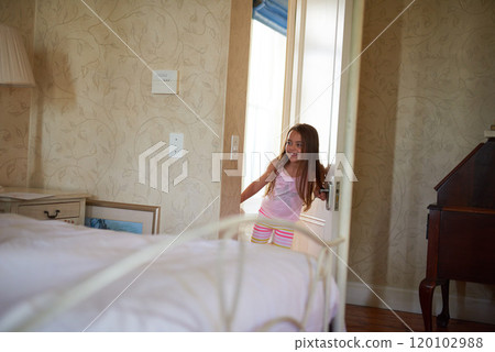 Kids will be kids. Shot of a little girl at home. 120102988