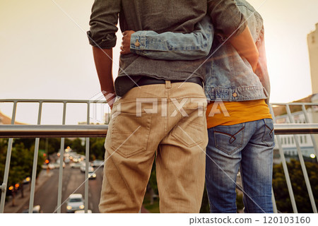 Making the city connection. Rearview shot of a couple standing together on a city bridge and looking at the view. 120103160