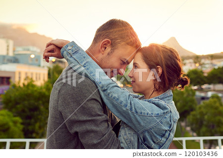 My heart beats for you. Shot of a happy young couple enjoying a romantic moment in the city. 120103436