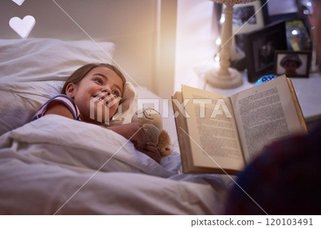 Did they live happily ever after. Shot of a father reading a bedtime story to his daughter. 120103491