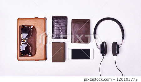 A must for the modern man. High angle shot of personal accessories. 120103772