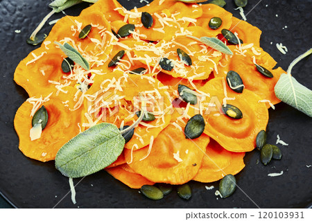 Fresh pumpkin ravioli, macro. 120103931