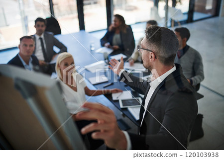 The business place to be. Shot of businesspeople having a meeting in the office. The business place to be. Shot of businesspeople having a meeting in the office. 120103938