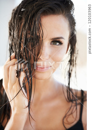 Feeling naturally gorgeous. Head shot of a stunning brunette with wet hair smiling at the camera. Feeling naturally gorgeous. Head shot of a stunning brunette with wet hair smiling at the camera. 120103963