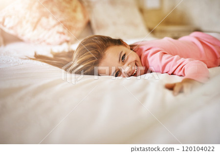I have this big bed all to myself. Shot of a little girl lying on bed. I have this big bed all to myself. Shot of a little girl lying on bed. 120104022
