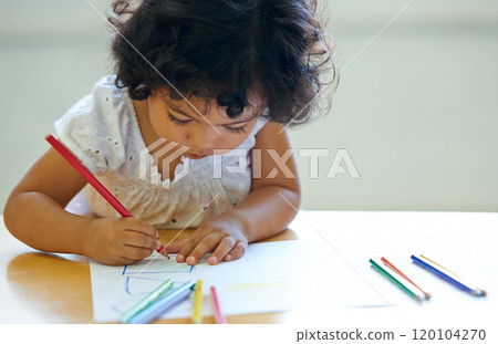 Learning as she grows. Shot of a cute little girl at home. 120104270