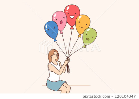 Emotional control is practiced by woman holding balloons with positive or negative grimace 120104347