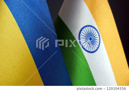 Flags of Ukraine and India side by side. Symbol of international collaboration. 120104356
