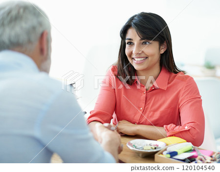 Sitting down with a new client. Cropped shot of a young female designer sitting down with a client. 120104540