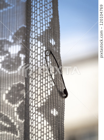 A pin on the tulle 120104769