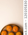Tangerines on a plate on white background 120105830