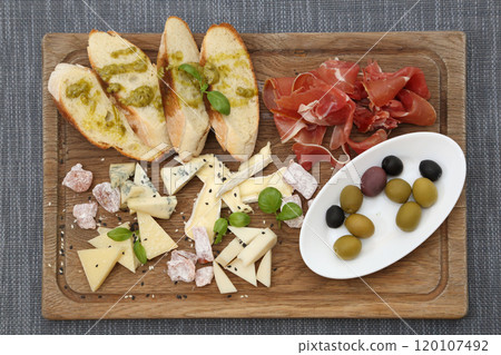 Plate for a good mood. Cold appetizers in a restaurant. A snack for a good mood. 120107492