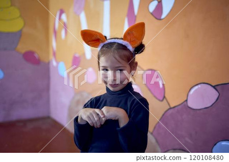 a little girl acts as a fox at an acting class, extracurricular activities a little girl acts as a fox at an acting class, extracurricular activities 120108480
